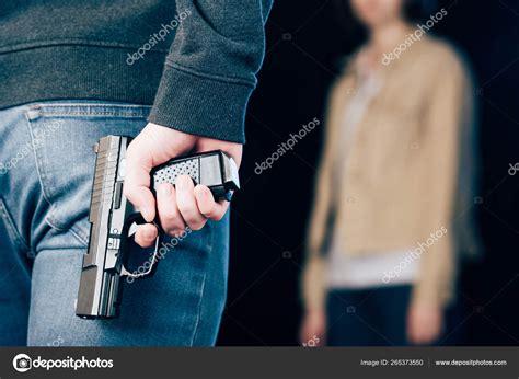 Cropped View Criminal Hiding Gun While Standing Woman Black Stock Photo