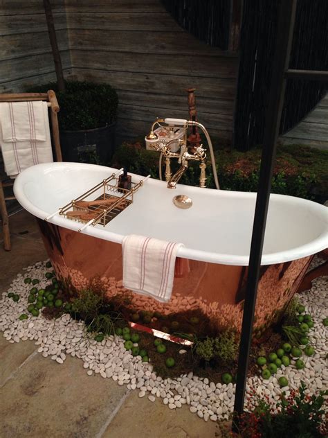 Ideas & inspiration » home decor » 65 ingenious indoor plant decor ideas. Copper tub sits in an outside garden bathroom! So pretty ...