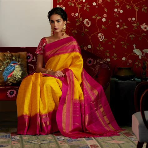 Yellow Kanjivaram Silk Saree With Majenta Temple Border Weaverstory