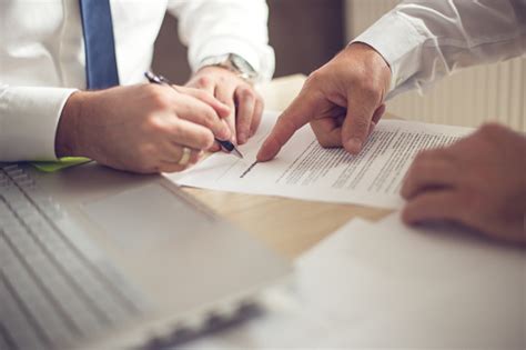 Business Man Signing A Contract Stock Photo Download Image Now Istock
