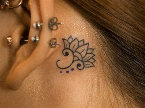 Beautiful Elegant Small Black Ink Lotus Flower Tattoo Behind Ear