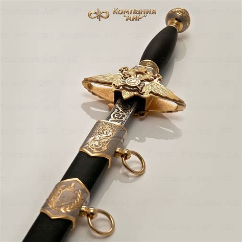 A Black And Gold Pen With An Eagle On The End Is Laying On A White Surface