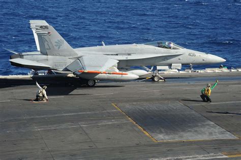 sailors aboard the aircraft carrier uss george h w nara and dvids public domain archive public