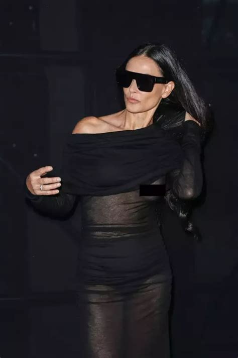 Demi Moore Suffers Daring Wardrobe Malfunction As She Raises Her Arms In See Through Dress
