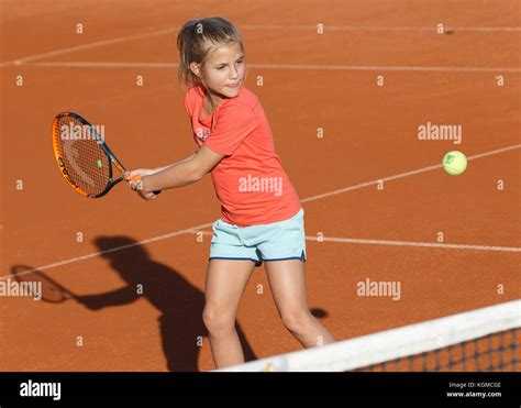 Young Girl 80 Playing Tennis Stock Photo Alamy
