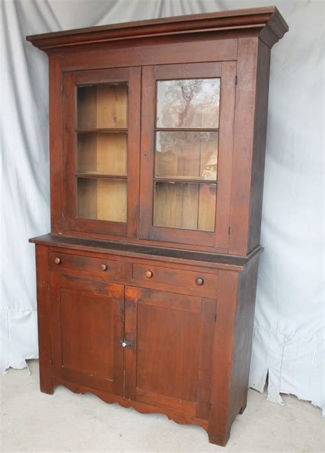 The kitchen cabinets are made out of white painted solid wood with decorative engravings paired with glass doors which hide a set of shelves for pastry storage. Bargain John's Antiques | 1880's Antique Walnut 2 Piece ...