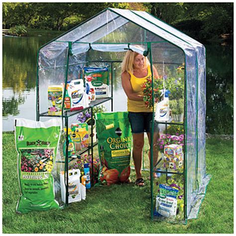 Simple greenhouse walk in greenhouse portable greenhouse greenhouse effect greenhouse ideas backyard greenhouse greenhouse growing contemporary greenhouses best. View Village Green® Basic Walk-In Greenhouse with Shelves ...