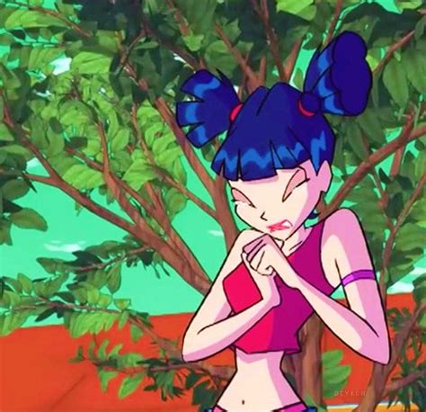 A Cartoon Girl With Blue Hair And Pink Top Standing In Front Of A Tree Holding Her Hands Together
