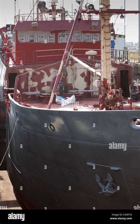Fishing Trawler In Shipyard Drydock Facilities For Repairs Maintenance