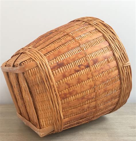 If rattan is treated right it can be transformed into almost anything, even furniture with generous forms that can fit in a flat pack. Large Vintage Bamboo Planter Hand Woven Basket Wicker ...