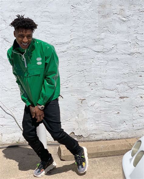 Youngboy Wearing An Off White Anorak Jacket And Versace Sneakers
