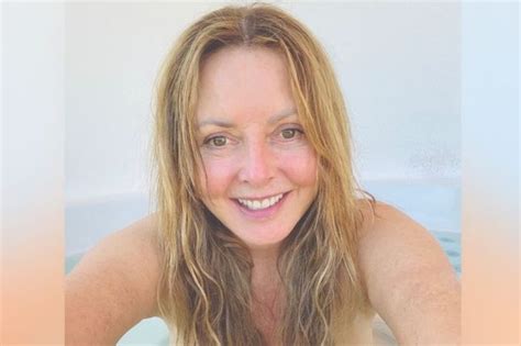 carol vorderman poses in nude bikini as she unwinds in hot tub liverpool echo