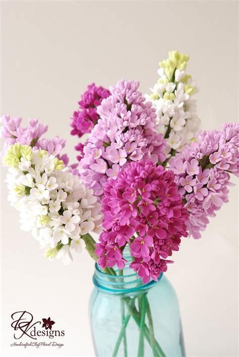 A purple and liac wedding bouquet with a unique shape is amazing for a summer bride or bridesmaid. DK Designs: Sneak Peek at a Stunning Wedding Bouquet in ...