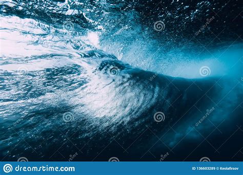Underwater Barrel Wave In Ocean And Sun Rays Water Texture In Ocean
