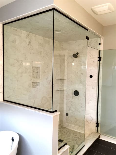 frameless shower enclosure door above door transom panel return panel with oil rubbed