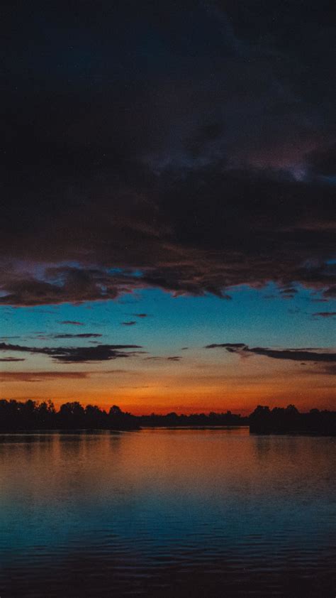 Download Wallpaper 720x1280 Lake Clouds Sunset Dark Samsung Galaxy