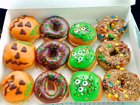 This is the perfect glazed donut ,shiny, crisp, love the rich color and the fine painting of the wax wrapper. i ate Halloween themed doughnuts from Krispy Kreme [oc ...
