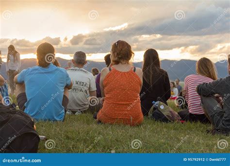 Group Of People In Nature Enjoying Sunset Editorial Photography Image