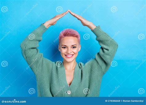 Photo Of Optimistic Charming Girl Show Dyed Pink Hairdo Showing Hands