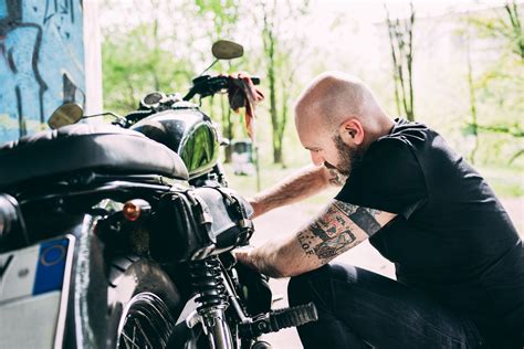 Make sure the motorcycle is off and twist the throttle back and forth while you spray carburetor cleaner on the needle. How to Maintain and Adjust Your Motorcycle Chain