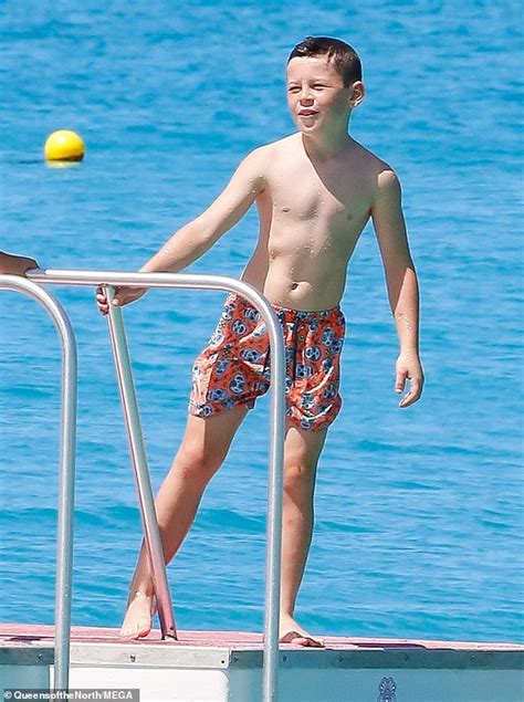 coleen rooney s son kai eight shows off his back flip skills on holiday in barbados daily
