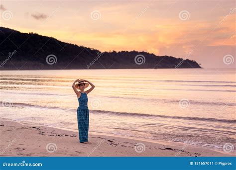 Woman Relaxing On The Beach With Sunset In Koh Kood Island Thailand