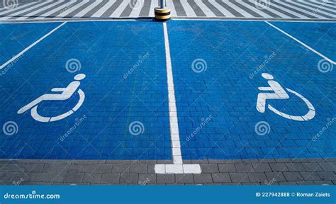 Handicapped Symbol Painted On A Special Parking Space For Disabled