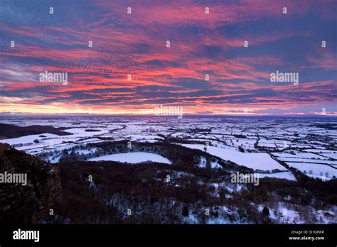 Fiery Sunset Over A Snow Covered Gormire Lake North Yorkshire