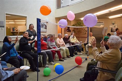 Seated Balloon Volleyball Exercise For Seniors