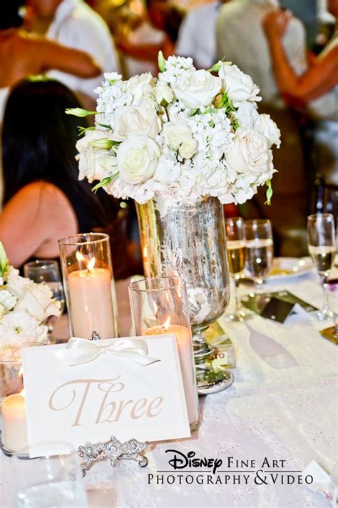 White Rose And Hydrangea Centerpiece In A Silver Mercury Glass Vase