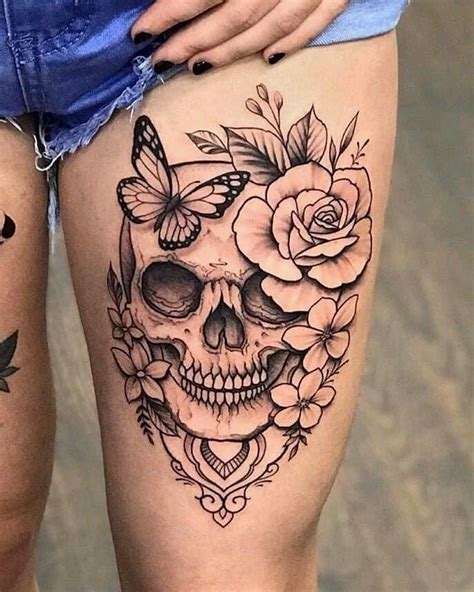 Pin By Kasha Smith On Tatto Love Feminine Skull Tattoos Skull Thigh Tattoos Girly Skull Tattoos
