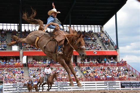 Rodeo Rider Busting Bronco Courtesy Of Cheyenne Frontier Days