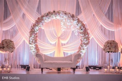 Marvelous Indian wedding reception mandap flowers decoration. | Photo