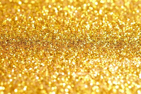 Sprinkle Glitter Gold Dust On A Black Background Stock Photo Image Of