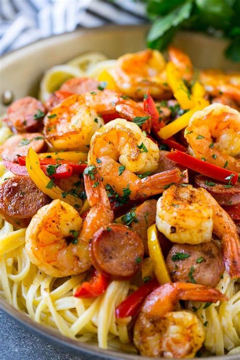 I found this recipe in the febuary/march 2003 issue of taste of home's light and tasty. This recipe for Cajun shrimp and sausage pasta is sauteed ...