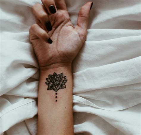 Lotus Tattoo On The Right Inner Wrist
