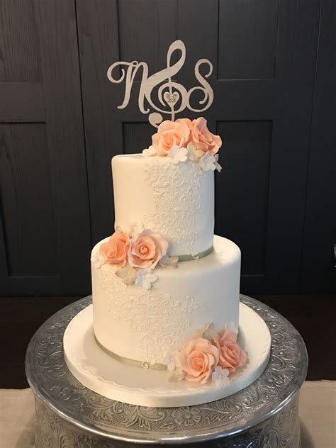 2 tier wedding cake with flowers karrie wynn