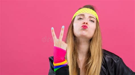 Woman In 1980`s Fashion Giving The Peace Sign Stock Photo Image Of