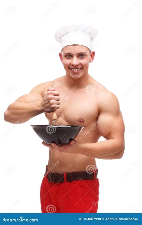 A Guy With A Bare Chest Torso Holds A Bowl With A Whisk On White Isolated Background Stock Photo