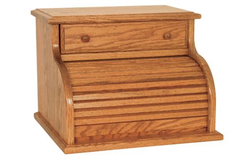 Bread box fanatics (presuming such a person exists) are split into two camps: Solid Cherry, Oak, Maple Roll Top Bread Box with Drawer