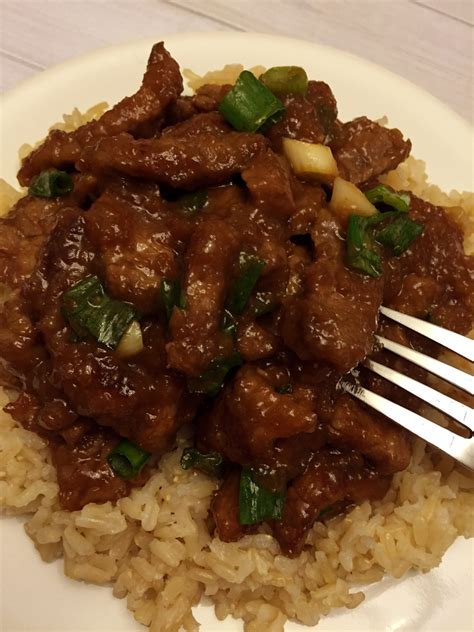 Quick cooked tender beef coated in a slightly sweet and savory sauce. Authentic Mongolian Beef Copycat Recipe Like PF Chang's ...