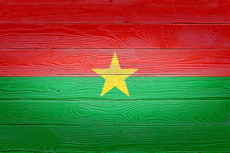Burkina Faso Flag Painted On Old Wood Plank Background Brushed Natural