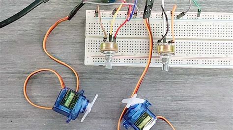 Realtime Servo Motor Control With Switches And Potentiometers