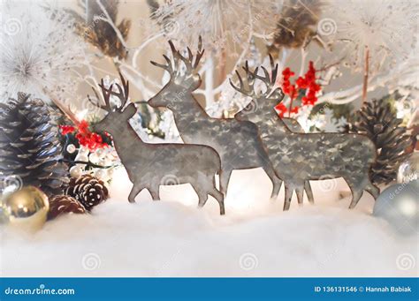 Reindeer Decorations In Snow With Pine Cones Stock Photo Image Of