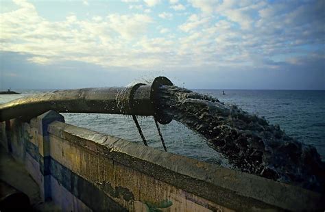 Raw Sewage Flows Into The Sea Photograph By Photostock Israel Fine