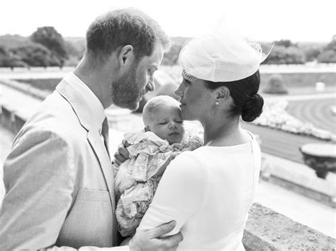 The duke of sussex cradled the apparently sleeping baby, wrapped in a white blanket and wearing a matching (photo: Weird News: Meghan Markle and Prince Harry released 2 new ...