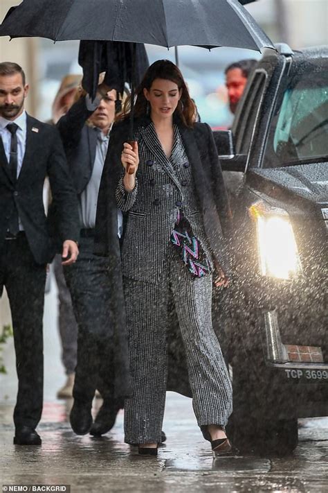 Anne Hathaway Cuts A Stylish Figure In A Striped Pantsuit For Her Jimmy