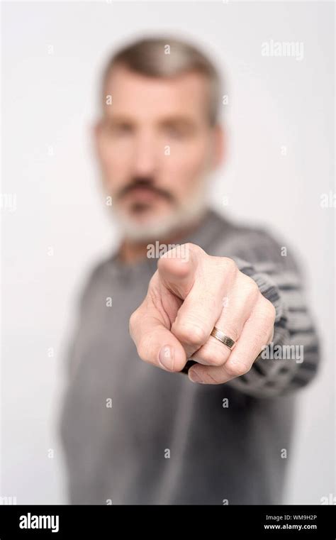 Senior Man Pointing His Finger Towards Camera Stock Photo Alamy