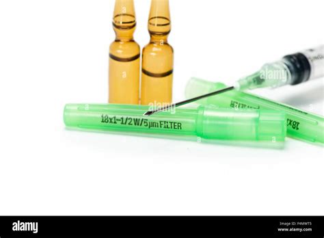Amber Glass Medication Ampules And Filter Needle With Syringe Stock