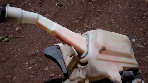 About 1/2 of the lip is missing, belt doesn't appear to be damaged. Tacoma washer fluid reservoir removal - YouTube